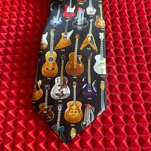 GUITAR NECKTIE “CLASSIC GUITARS 1910-1996” by MUSEUM ARTIFACTS